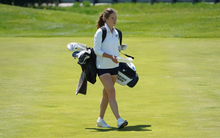 Lia Rody prepares to putt