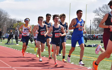 UIS Men's Track runners in blue uniforms running on track