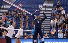 Erica Sledge playing volleyball as setter