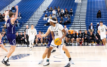 Marlon Williams playing basketball at UIS