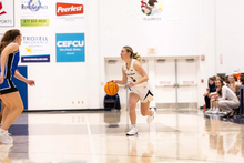 Julia Mingus playing basketball