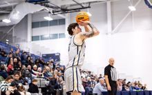Isaiah Davis playing basketball at UIS