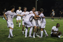 UIS men's soccer celebrates a goal