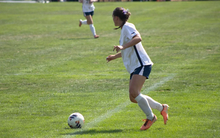 Abbie Gleason playing soccer