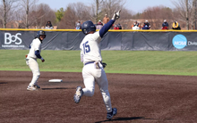Hunter Moser celebrates a walk-off grand slam