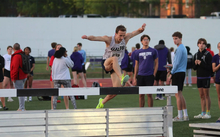 Ryan Jones jumping water barrier in steeplechase
