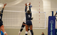 Erica Sledge blocking at the net