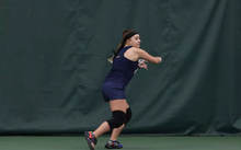 Kamilia Kalinowska playing tennis 