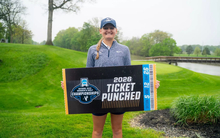 Elaine Grant with NCAA "Ticket Punched" sign