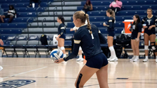 Maddie Mendelblatt serving
