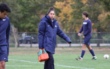Samantha Fuentes, athletic trainer on field at UIS