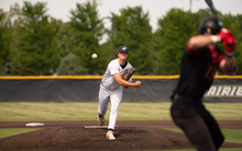 Ben Benoit pitching to UMSL batter at UIS