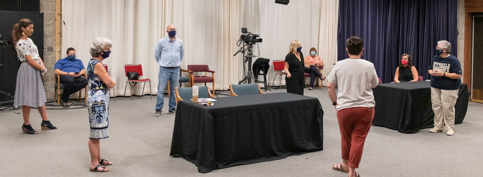 faculty preparing for an on-camera event