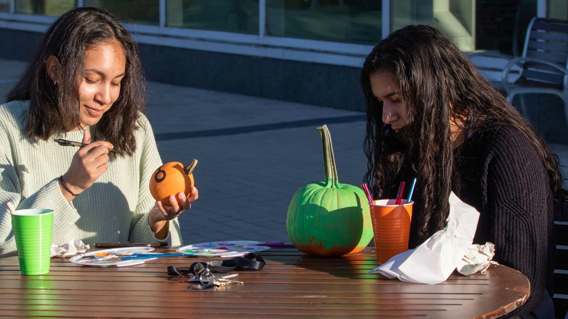 students making pumpkins