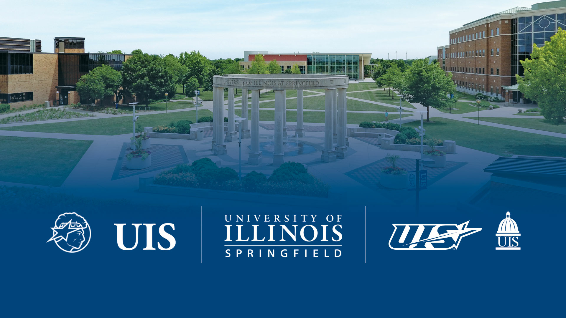 A wide shot of the campus, colonnade in the center, fades to blue at the bottom and shows five UIS logos and wordmarks.
