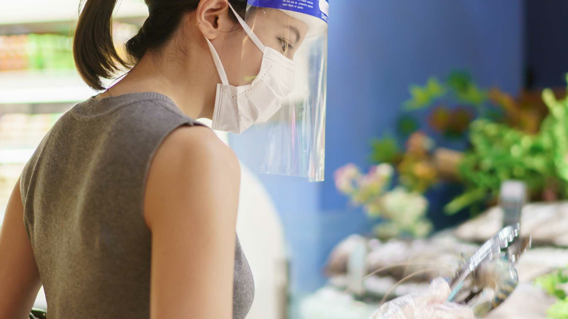 woman working with face cover