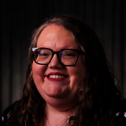 Headshot of Courtney Adams.