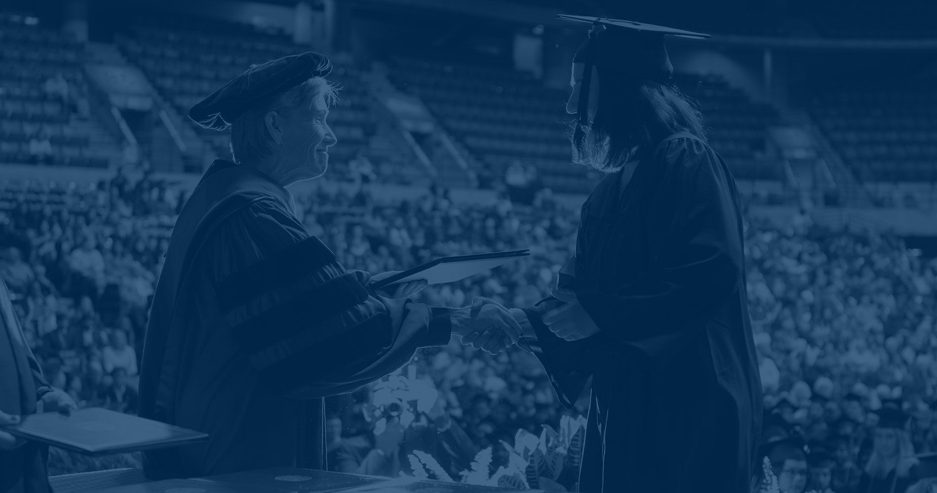 student getting diploma