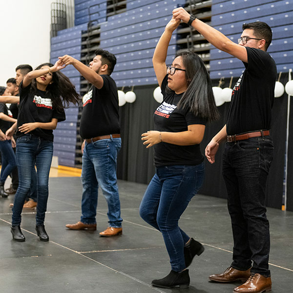 Students demonstrate dance steps