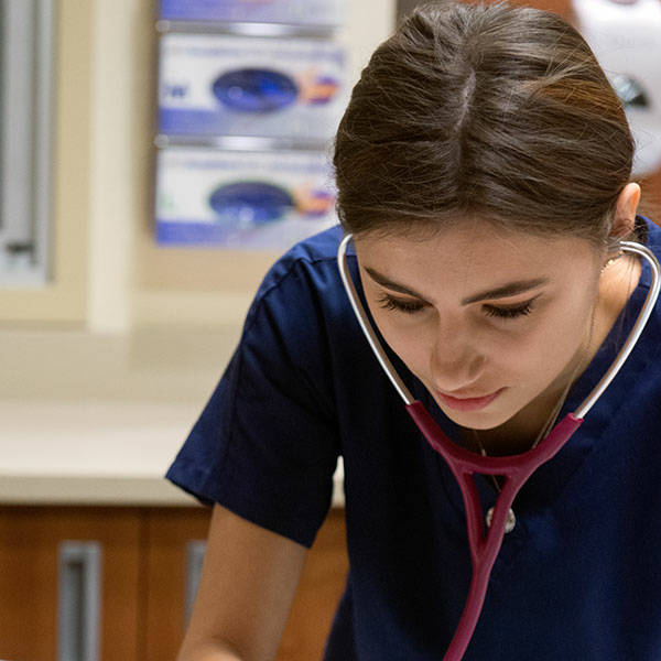 UIS Nursing student during a patient simulation
