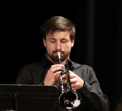 man playing trumpet