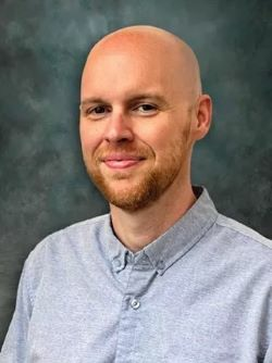 headshot of Brandon Damm