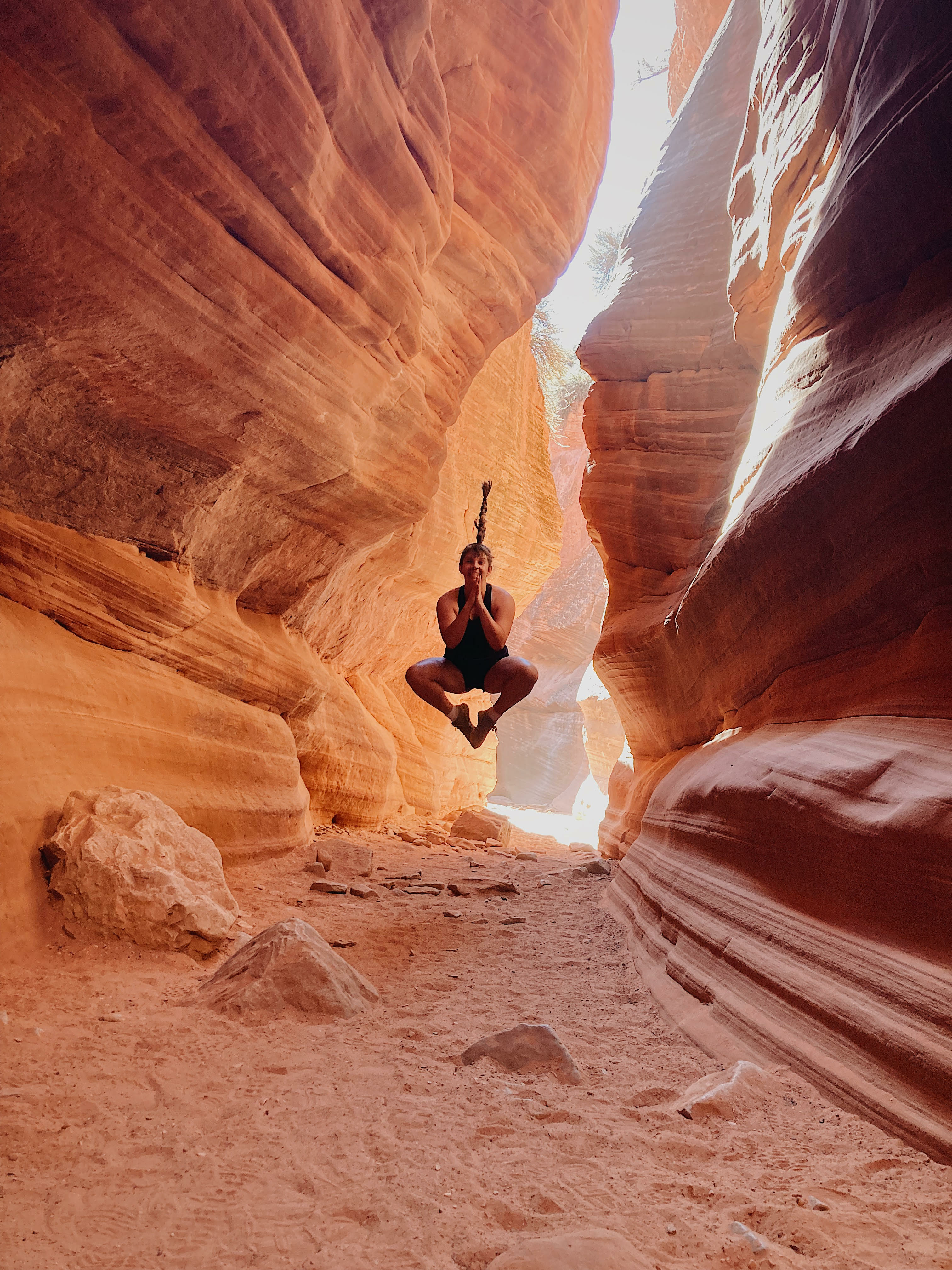 Student jumping inside of Antelope Canyon, Arizona