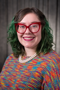 Headshot of Dre Duvendack.