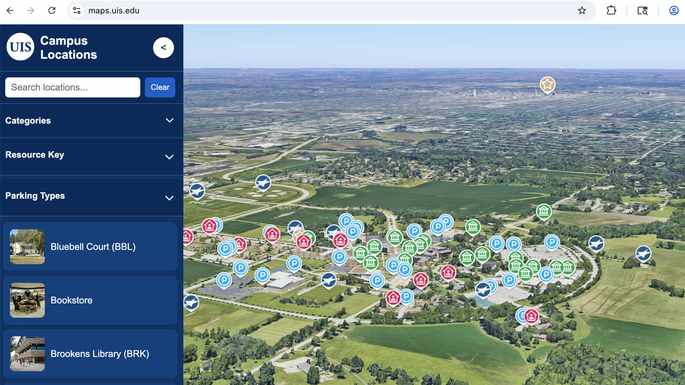Interactive campus map covered with location markers, showing greenery and city in background