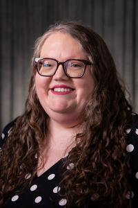Headshot of Courtney Adams.