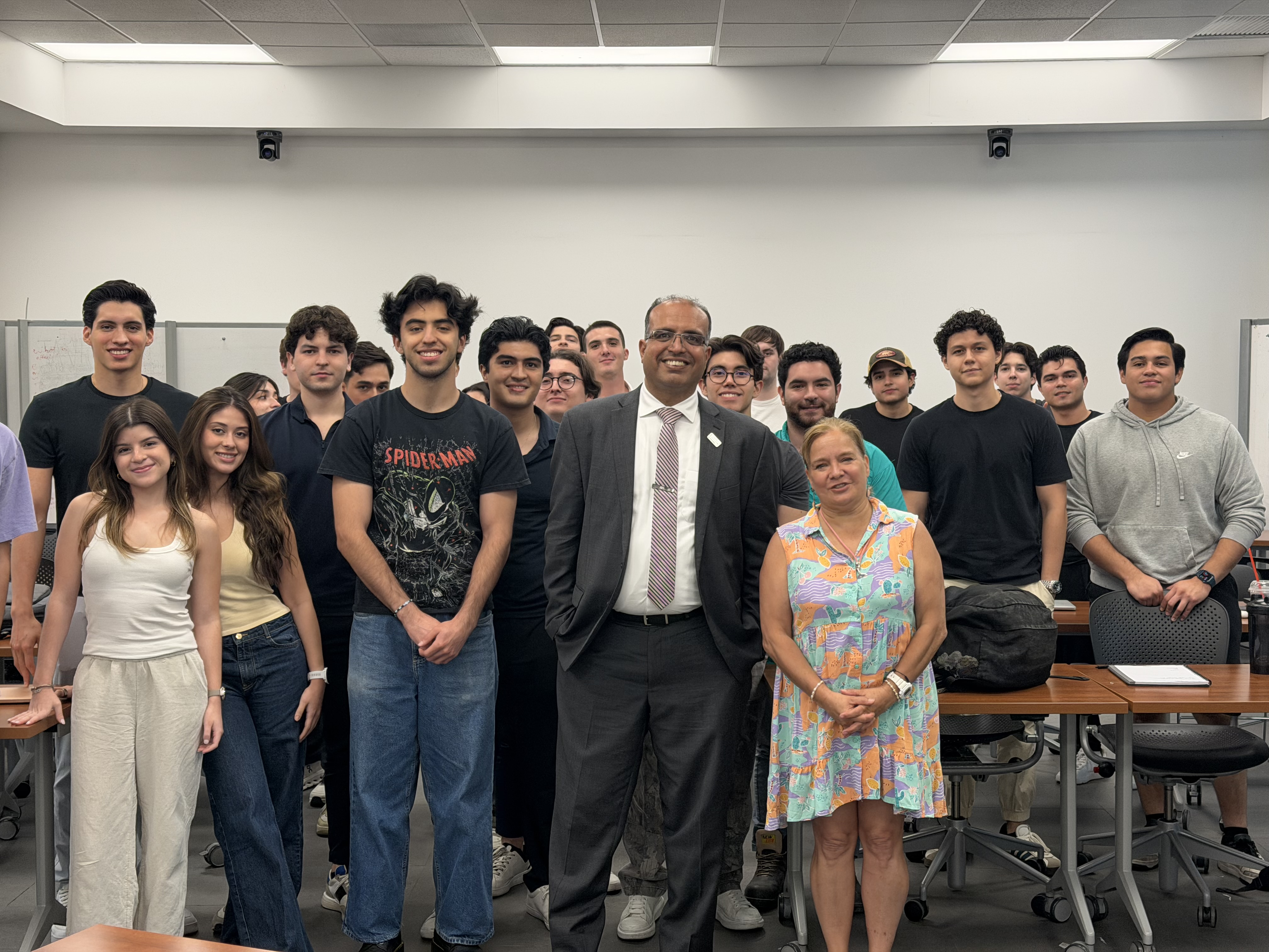 UIS professor Sudeep Sharma poses with students and faculty during a classroom visit at Tecnológico de Monterrey.