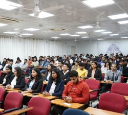 About 70 students at IIM sitting in a classroom facing forward