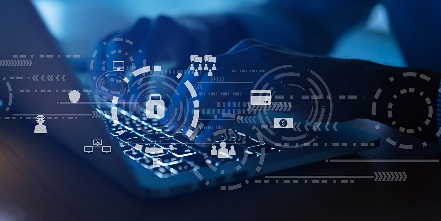 person at laptop with cybersecurity icons superimposed on the image