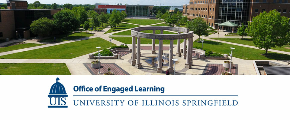 bird's eye view of the quad and the colonnade with the OEL's logo under the photo