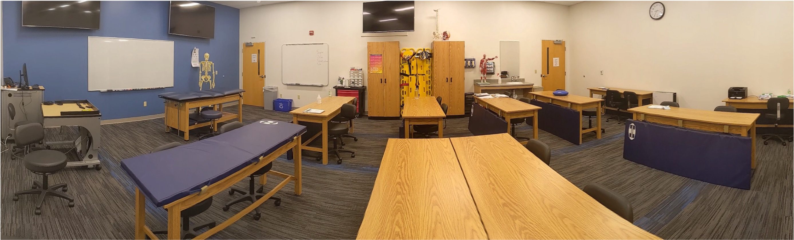 Athletic Training Classroom panoramic view of tables and equipment