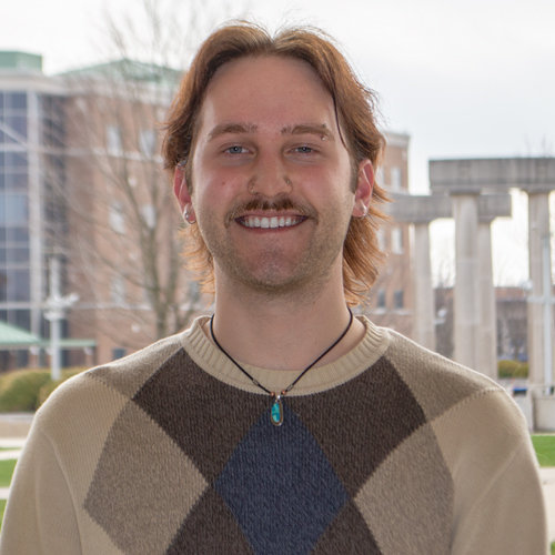 headshot of Tim