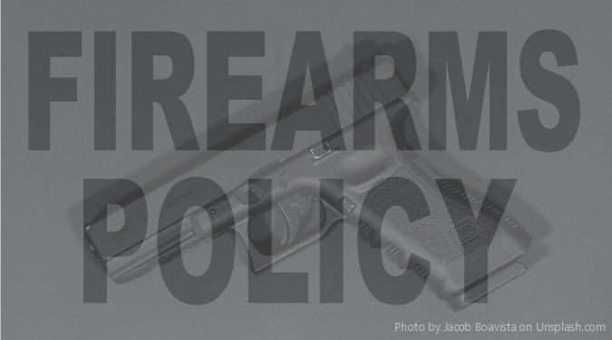semi automatic pistol with the words "Firearms policy" overlaid on top of it