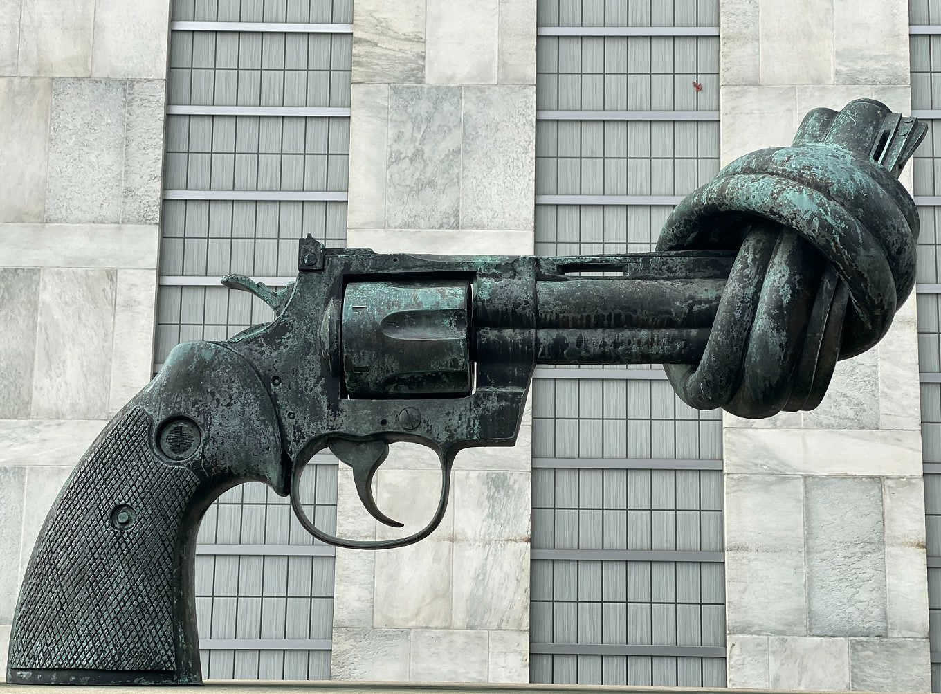 sculpture of a revolver with a twisted barrel