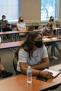 students in class with masks