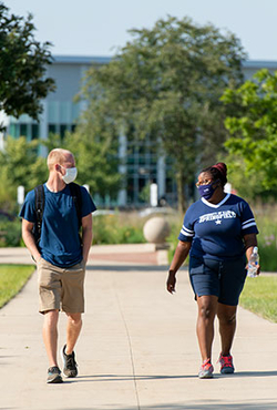 students walking on campus