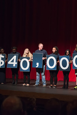 Students on stage announcing campaign