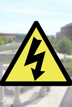 Power outage symbol over campus shot