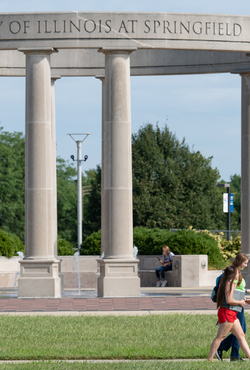 Students walking by UIS Colonnade