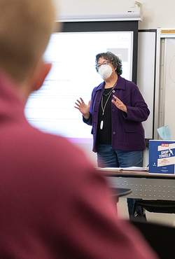 Professor teaching in-person class