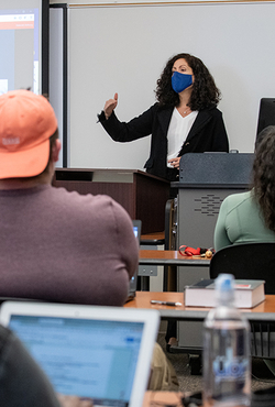 Professor teaching in-person class