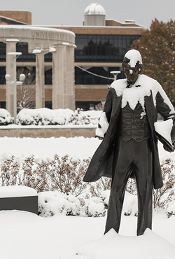 Snow covered Lincoln statue and colonnade 