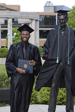 Graduate in gap and gown