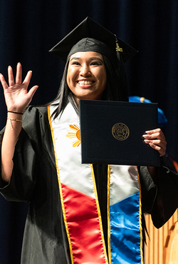 Graduate in cap and gown