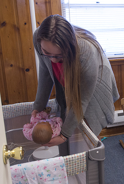 A student involved in a child protection simulation