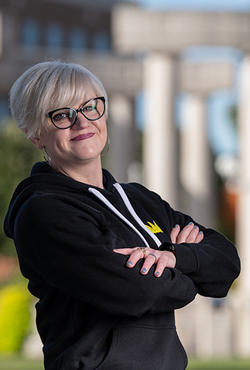 Jennifer Martin standing in front of the UIS colonnade 